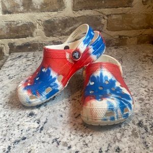 Crocs red white blue tie dye.